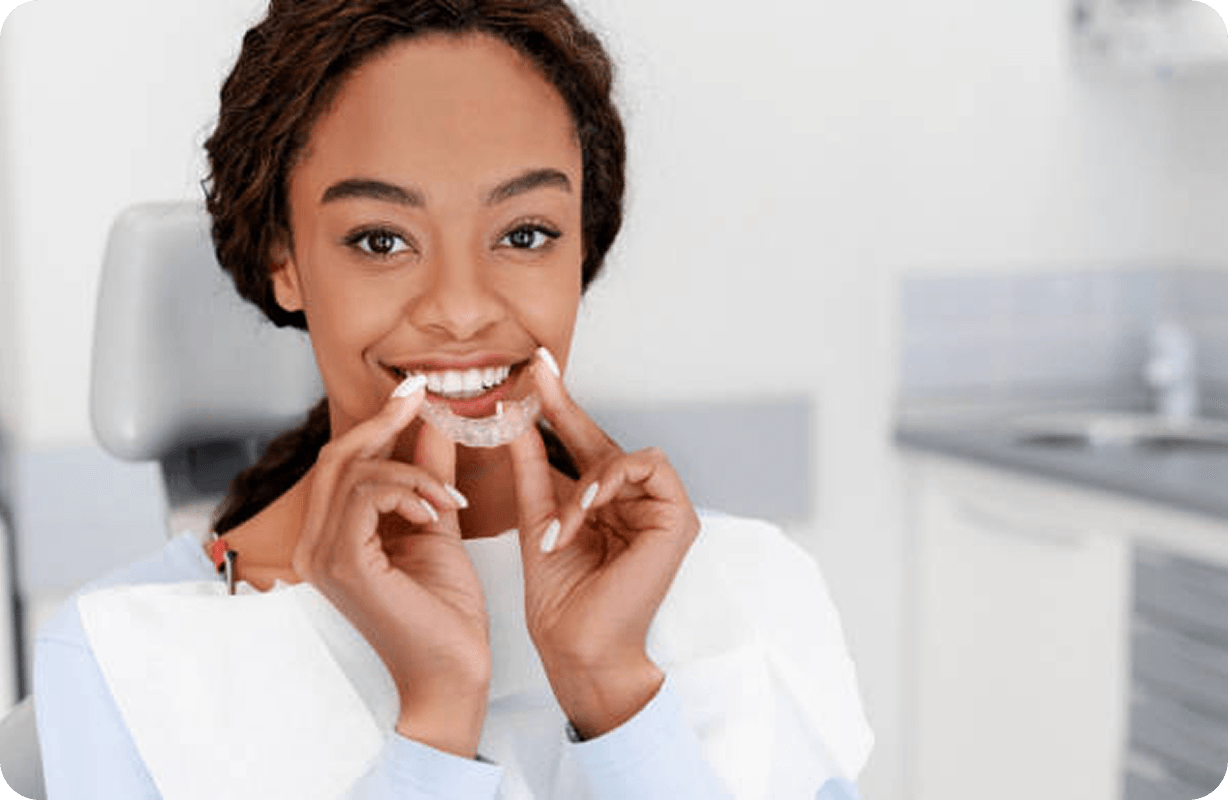 woman wearing aligners